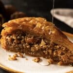 An image of an indulging baklava portion served in a plate